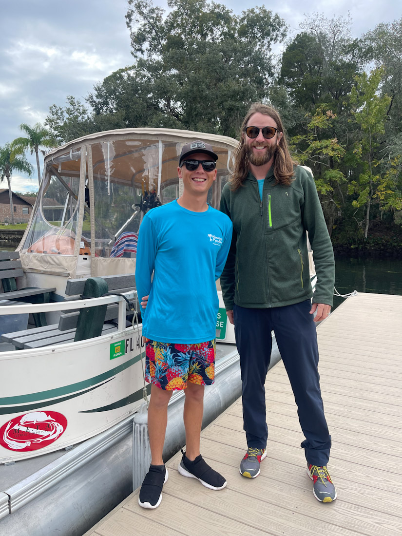 Jake and Derek standing by Manatees in Paradise Crystal River Florida boat