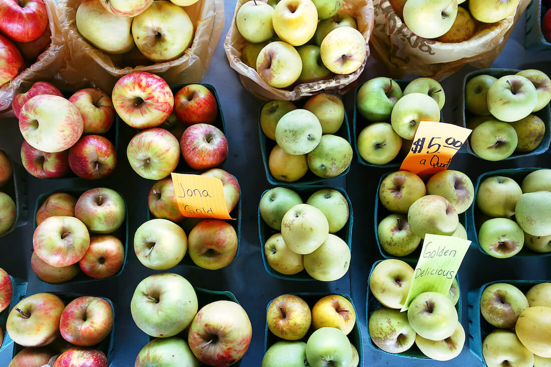 Jona Gold and Golden Delicious apples for sale at the State Farmers Market in Raleigh, North Carolina