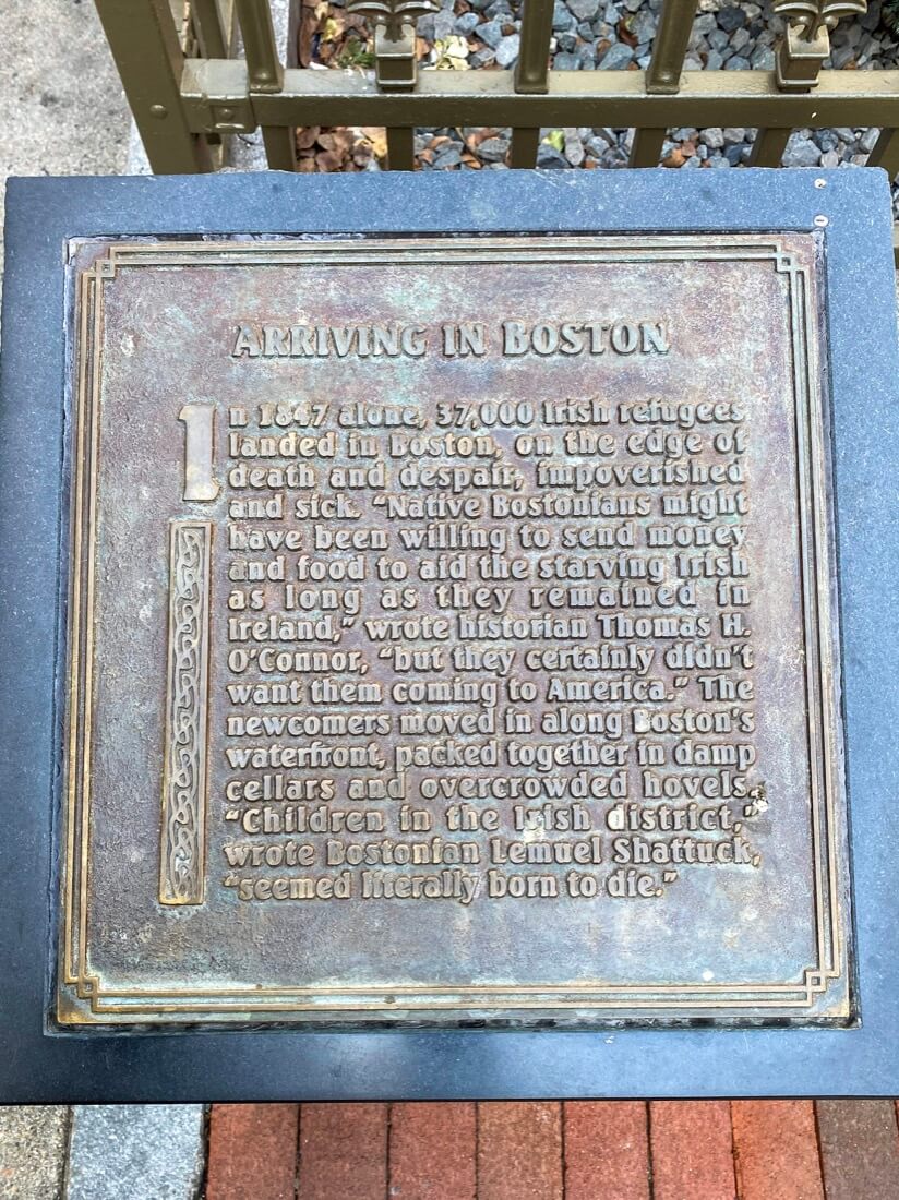 Plaque about Arriving in Boston at the Boston Irish Famine Memorial in Massachusetts