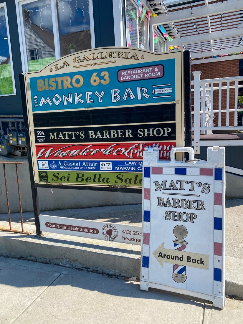 Signs for The Monkey Bar and Bistro 63 in Amherst Massachusetts