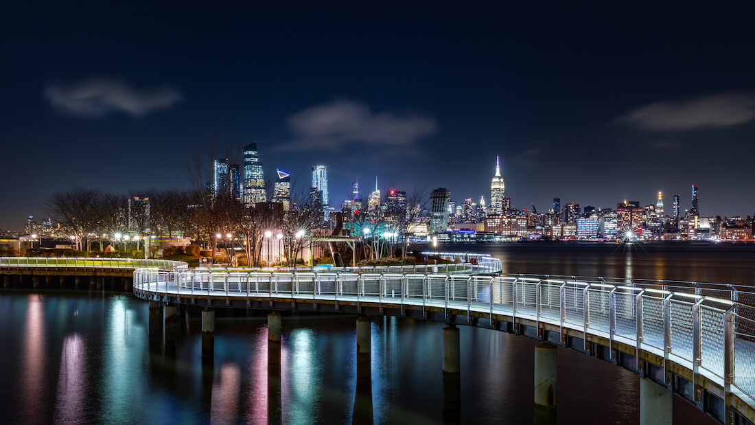 Pier C park in Hoboken, New Jersey at night
