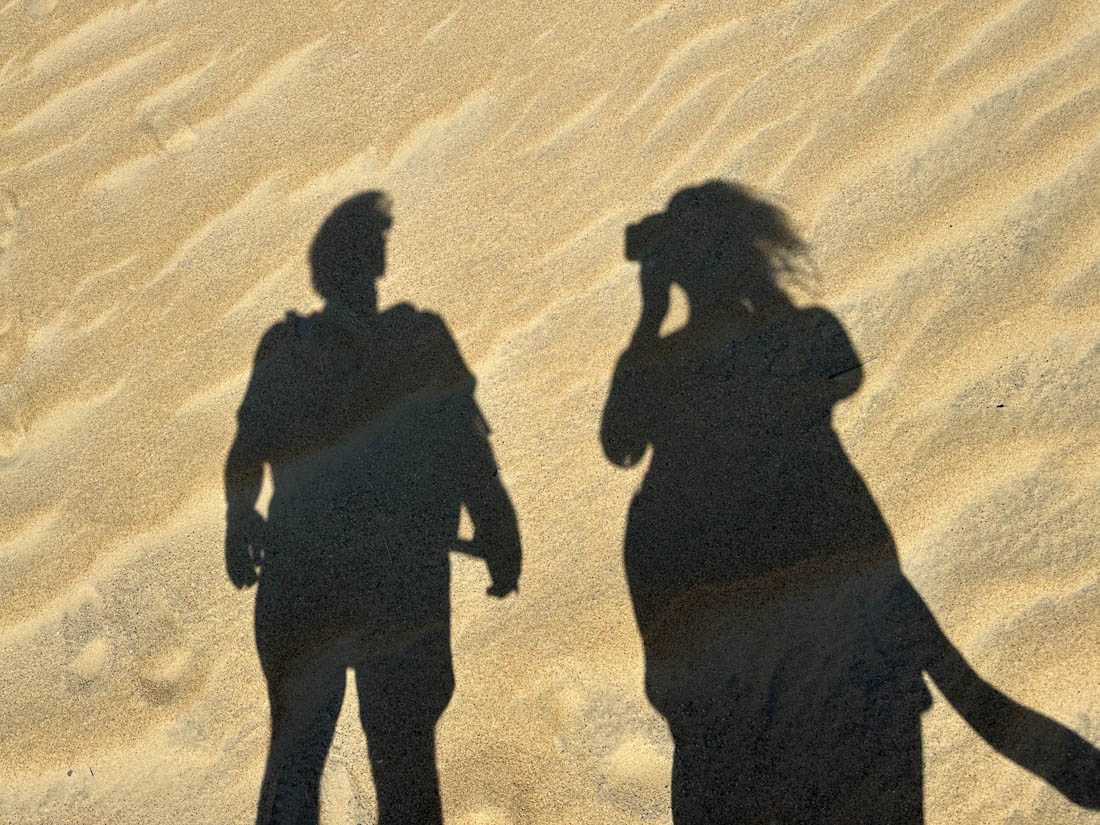 Couple Shadow in Dunes at Jockey’s Ridge Park Nags Head in Outer Banks 