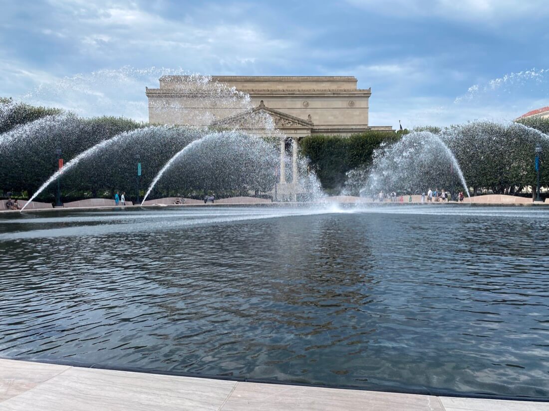 The fountain and National Gallery of Art building from the Sculpture Garden in Washington DC