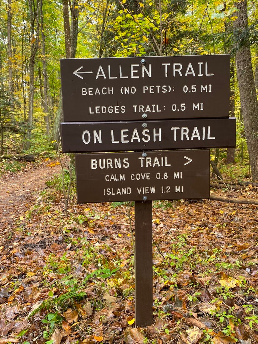 Allen Trail and Burns Trail signs in Niquette Bay State Park Vermont