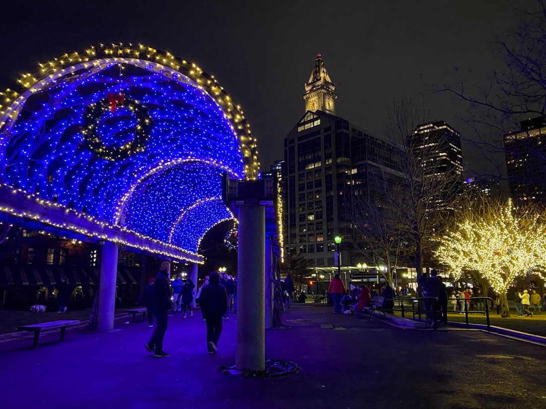 Blue Christmas lights and skyline at Christopher Columbus Park in Boston in Massachusetts