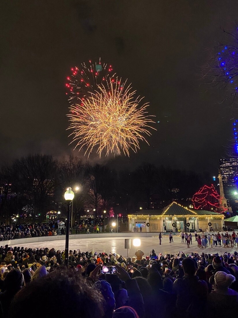 Fireworks over Boston Common and Frog Pond on New Years Eve in Boston Massachusetts