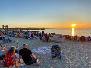 Sunset crowds at Menemsha Beach in Menemsha Chilmark Marthas Vineyard Massachusetts