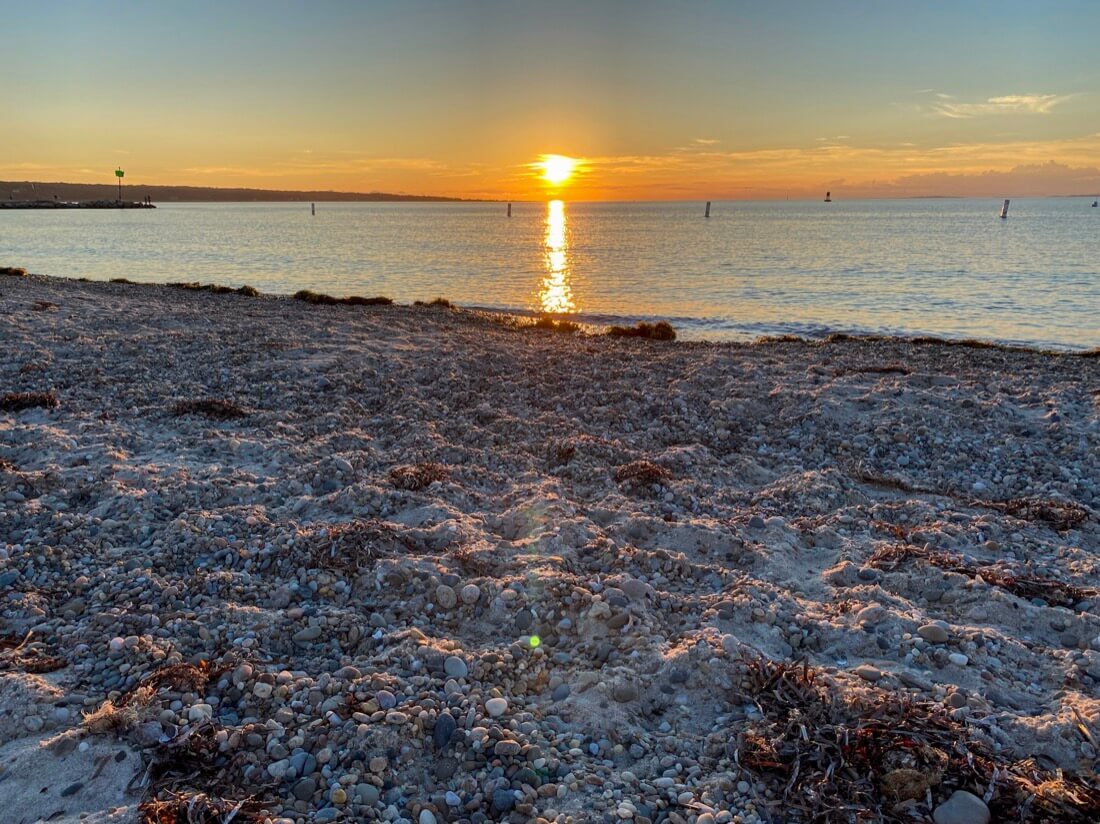 Sunset over Menemsha Beach in Menemsha Chilmark Marthas Vineyard Massachusetts
